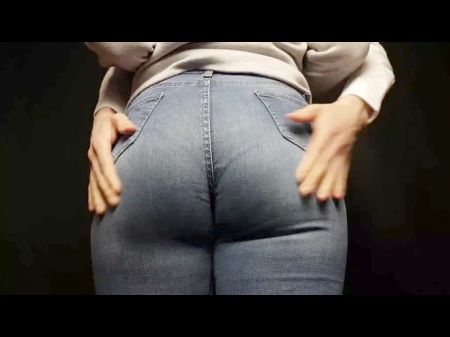 Сексуальная девушка с большой задницей в тесных джинсах 