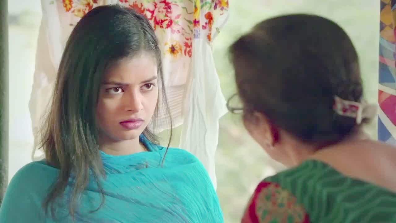 A woman’s face in the throes of pleasure