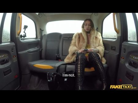 Ava Austen Rides A Huge Ebony Fake Penis On The Backseat