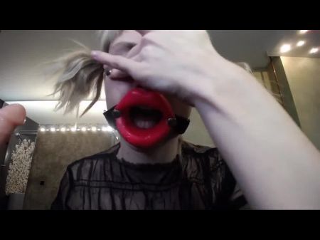Russian Chick Copulates Herself In The Mouth With A Rubber Penis
