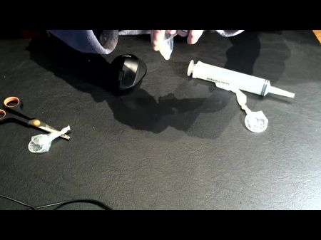 Toying With Spunk Out Of A Condom For Strangers