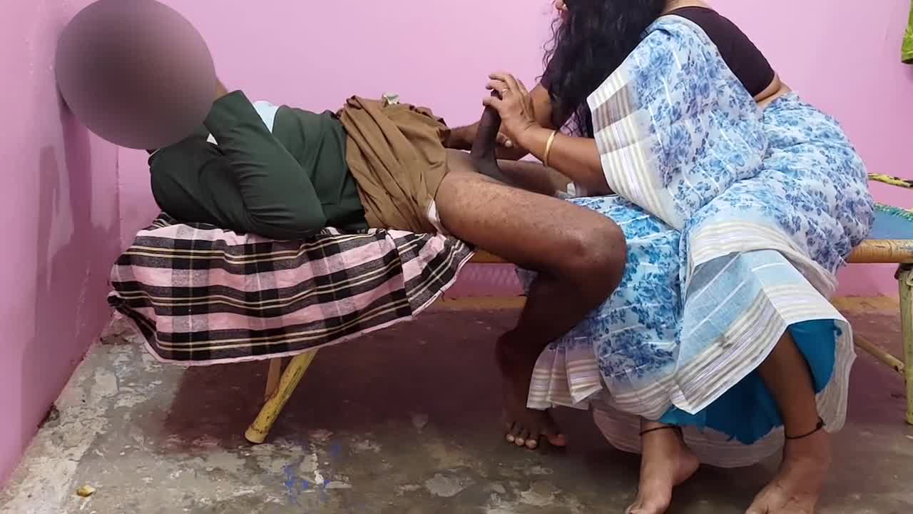 Tamil aunty Bavana pulls her nephew closer