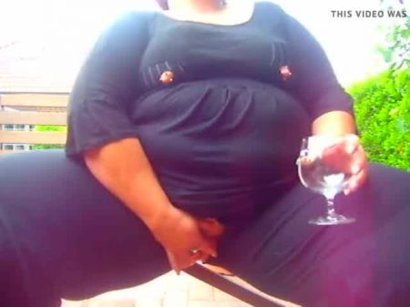 Bbw Drinks Champagne On The Deck