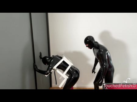 Touchedfetish – Spandex & Bondage & Discipline Couple In Rubber Catsuits - Obedient Gimp Is Trussed Up , Ball-gagged In Bondage , Slapped , Lashed & Padd