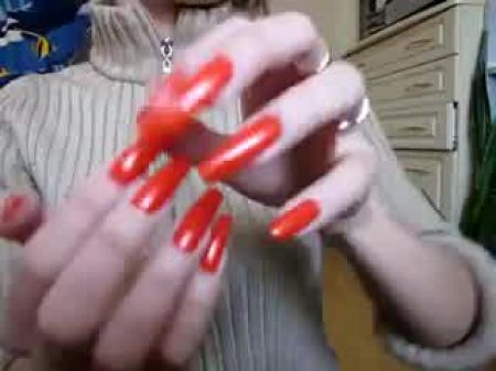 أظافر برتقالية طويلة جميلة 