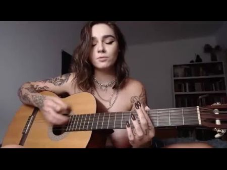 Big-chested Emo Girl Plays Wicked Game On Guitar