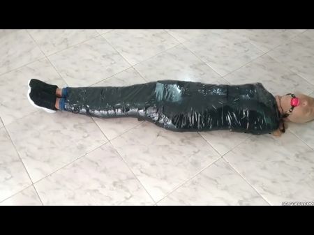 Gauze Mummified Dame In Pantyhose Hooded And Ball Gagged