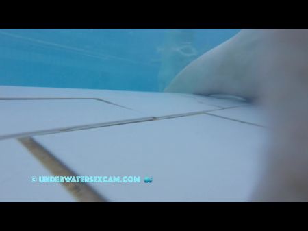 This Ultra-cute Chick Demonstrates Her Ginormous Boobs Underwater In The Pool While The Web Cam Is Witnessing Her !