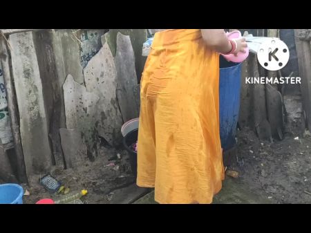 Indian Building Wife Bathing Outside