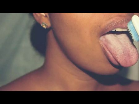 Obscene Dark-hued Frolicking With Her Toothbrush And Her Stunning Mouth