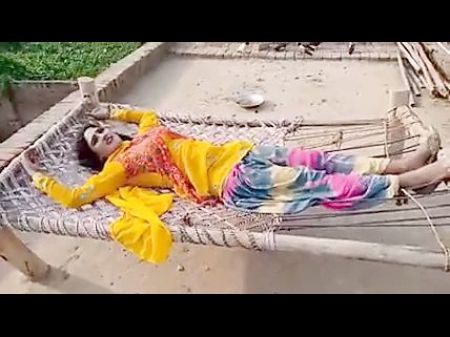 Indian Village Dame Displays Her Milk Cans And Converses In Hindi