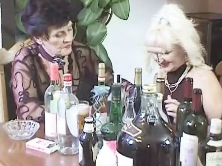 Two Crazy Ladies From Germany Pleasing Each Other After A Game Of Cards