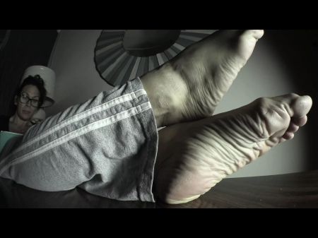 Magnificent Wrinkled Mellow Feet On The Table